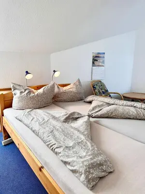 Ein Bett oder Betten in einem Zimmer der Unterkunft Ferienwohnung De Düker