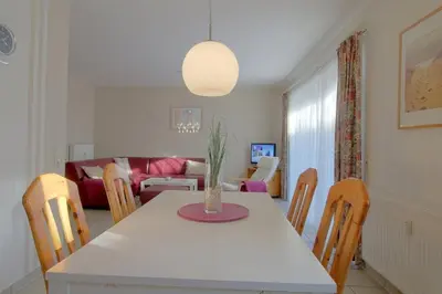 Ein Bett oder Betten in einem Zimmer der Unterkunft DW10a FeWo Pottkieker