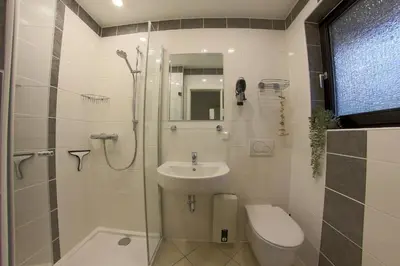 Ein Badezimmer in der Unterkunft SV2 Robbenplate 18 Ferienhaus Robbe