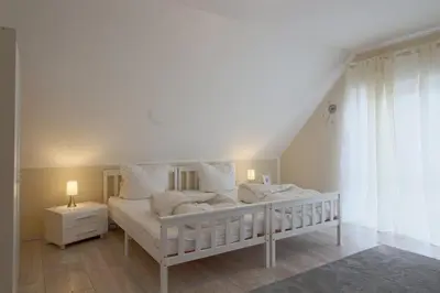 Ein Bett oder Betten in einem Zimmer der Unterkunft Ferienhaus 