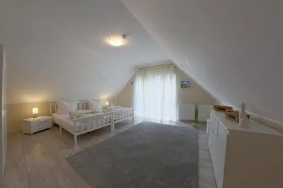 Ein Bett oder Betten in einem Zimmer der Unterkunft Ferienhaus 