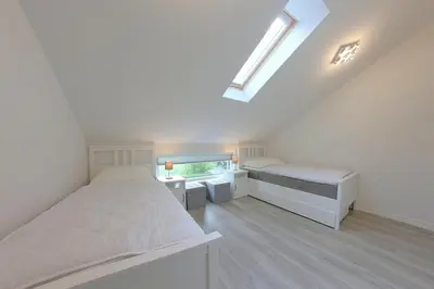 Ein Bett oder Betten in einem Zimmer der Unterkunft KW4a Haus Leni