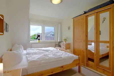 Ein Bett oder Betten in einem Zimmer der Unterkunft SI30-h FeWo Delphin
