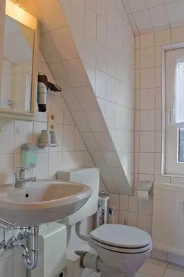 Ein Badezimmer in der Unterkunft SI30-h FeWo Delphin