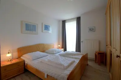 Ein Bett oder Betten in einem Zimmer der Unterkunft KD6-22 Kajediek