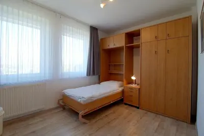 Ein Bett oder Betten in einem Zimmer der Unterkunft KD6-22 Kajediek