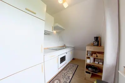 Küche/Küchenzeile in der Unterkunft MU32a Dachgeschoss mit Gartenanteil