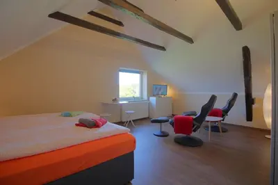 Ein Bett oder Betten in einem Zimmer der Unterkunft Gästehaus Dorum 05