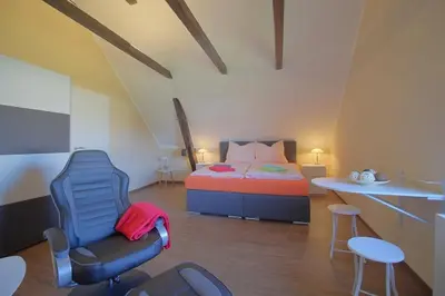Ein Bett oder Betten in einem Zimmer der Unterkunft Gästehaus Dorum 05