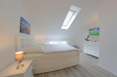 Ein Bett oder Betten in einem Zimmer der Unterkunft KW4 Haus Anna