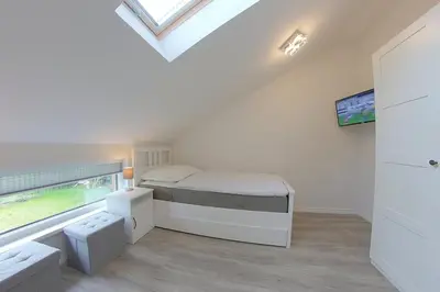 Ein Bett oder Betten in einem Zimmer der Unterkunft KW4 Haus Anna