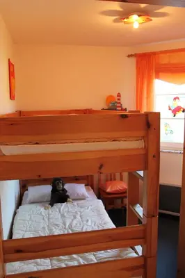 Ein Bett oder Betten in einem Zimmer der Unterkunft STW45b Bungalow Seestern