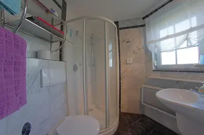 Ein Badezimmer in der Unterkunft STW45b Bungalow Seestern