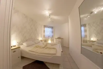 Ein Bett oder Betten in einem Zimmer der Unterkunft LT 33 Bungalow Manu