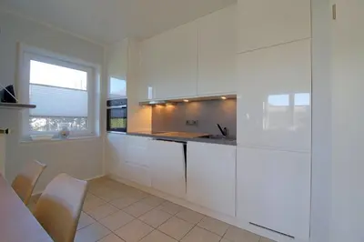Küche/Küchenzeile in der Unterkunft SI5-01 Terrassenwohnung Deichnah