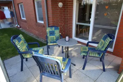 Ein Patio oder anderer Außenbereich in der Unterkunft SI5-01 Terrassenwohnung Deichnah