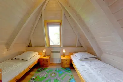 Ein Bett oder Betten in einem Zimmer der Unterkunft SV4 Tegeler Plate 12 