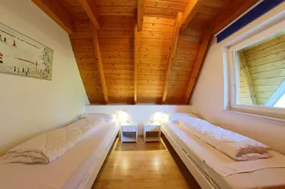 Ein Bett oder Betten in einem Zimmer der Unterkunft SV3 Nordertill 9