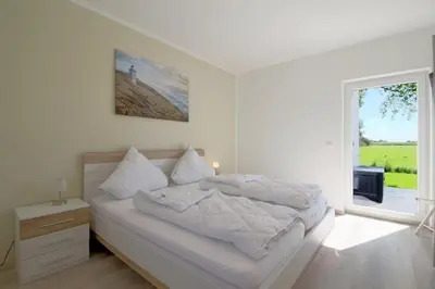 Ein Bett oder Betten in einem Zimmer der Unterkunft KW6 Haus Weitblick