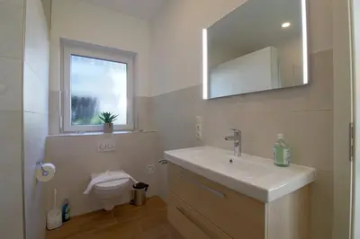 Ein Badezimmer in der Unterkunft KW6 Haus Weitblick