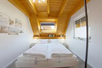 Ein Bett oder Betten in einem Zimmer der Unterkunft SV3 Lale Andersen 21 