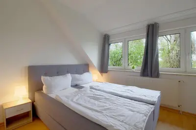 Ein Bett oder Betten in einem Zimmer der Unterkunft Sie4-03