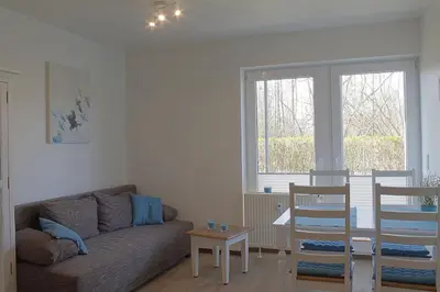 Ein Sitzbereich in der Unterkunft Haus Amrum WE 11
