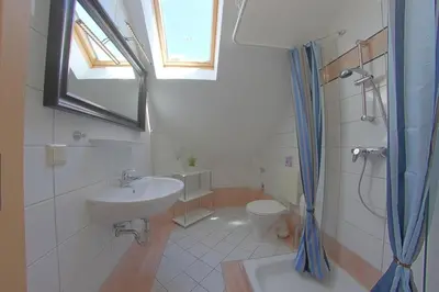 Ein Badezimmer in der Unterkunft PM11 FeWo Leuchtturm Wremen