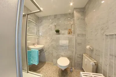 Ein Badezimmer in der Unterkunft Haus Borkum De lütte Stuuv