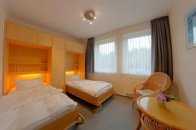 Ein Bett oder Betten in einem Zimmer der Unterkunft KD12-48 Kajediek