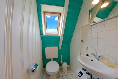 Ein Badezimmer in der Unterkunft SV3 Medemsand 10