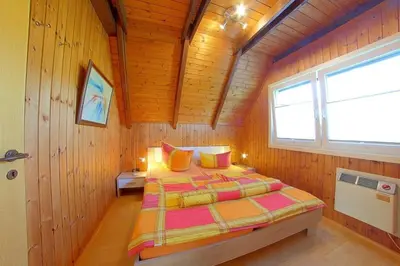 Ein Bett oder Betten in einem Zimmer der Unterkunft SE Opi-Huck-Stroot 12