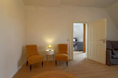 Ein Sitzbereich in der Unterkunft AO Hof Imsum - 04
