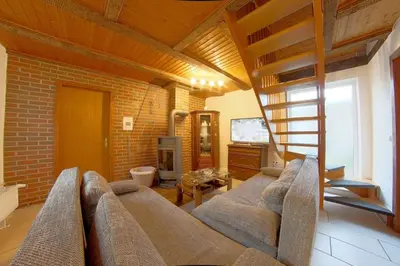 Ein Sitzbereich in der Unterkunft Dat lütte Hus