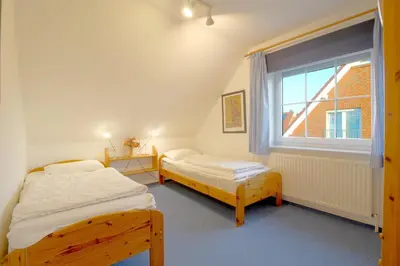 Ein Bett oder Betten in einem Zimmer der Unterkunft MU17 Haus Godewind