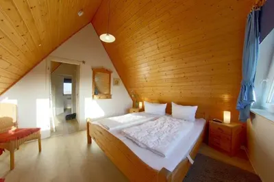 Ein Bett oder Betten in einem Zimmer der Unterkunft SR Nordertill 7