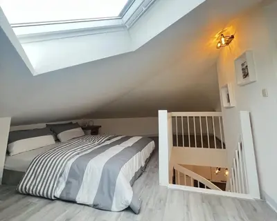 Ein Bett oder Betten in einem Zimmer der Unterkunft LT35a Haus Sternengucker