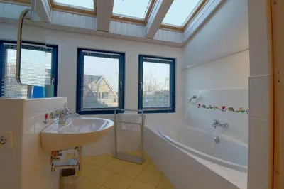Ein Badezimmer in der Unterkunft KA6 Haus Küstenzeit