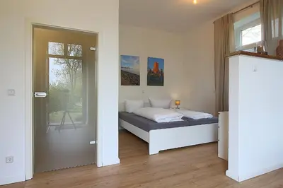 Ein Bett oder Betten in einem Zimmer der Unterkunft AO Hof Imsum - 01