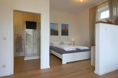 Ein Bett oder Betten in einem Zimmer der Unterkunft AO Hof Imsum - 01