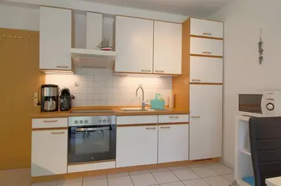 Küche/Küchenzeile in der Unterkunft KD12-46 NordseeFlair