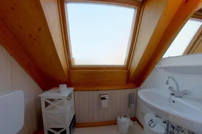 Ein Badezimmer in der Unterkunft SE RP8 Ferienhaus am Wattenmeer