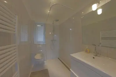Ein Badezimmer in der Unterkunft NS 6 Strandläufer Wremen