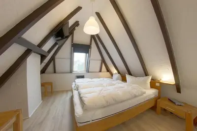 Ein Bett oder Betten in einem Zimmer der Unterkunft SV2 Opi-Huck 20