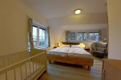 Ein Bett oder Betten in einem Zimmer der Unterkunft KI 22-WE 01 Wohlfühldomizil