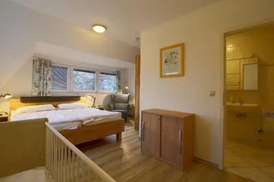 Ein Bett oder Betten in einem Zimmer der Unterkunft KI 22-WE 01 Wohlfühldomizil