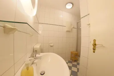 Ein Badezimmer in der Unterkunft KI 22-WE 01 Wohlfühldomizil