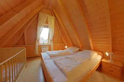 Ein Bett oder Betten in einem Zimmer der Unterkunft SV3 Westertill 2