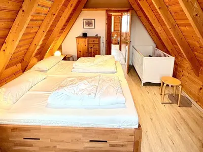Ein Bett oder Betten in einem Zimmer der Unterkunft SV2 Nordertill 15