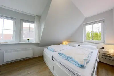 Ein Bett oder Betten in einem Zimmer der Unterkunft KI8a Ferienhaus Ruby